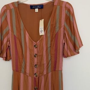 Short sleeve Jumpsuit. NWT